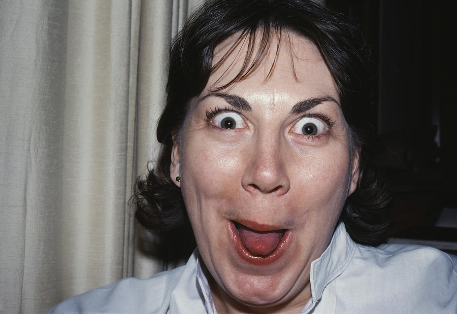 Woman making funny faces, portrait, close-up Photograph by Erik Von Weber