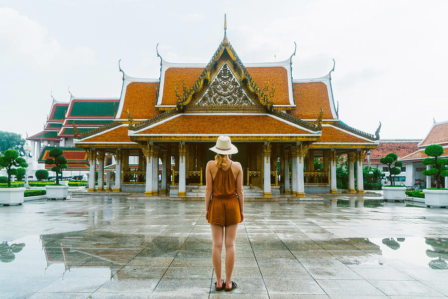 Woman near the Wat Ratchanatdaram in Bangkok Photograph by Oleh_Slobodeniuk