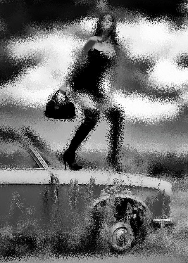 Woman On Abandoned Car In Black And White Photograph