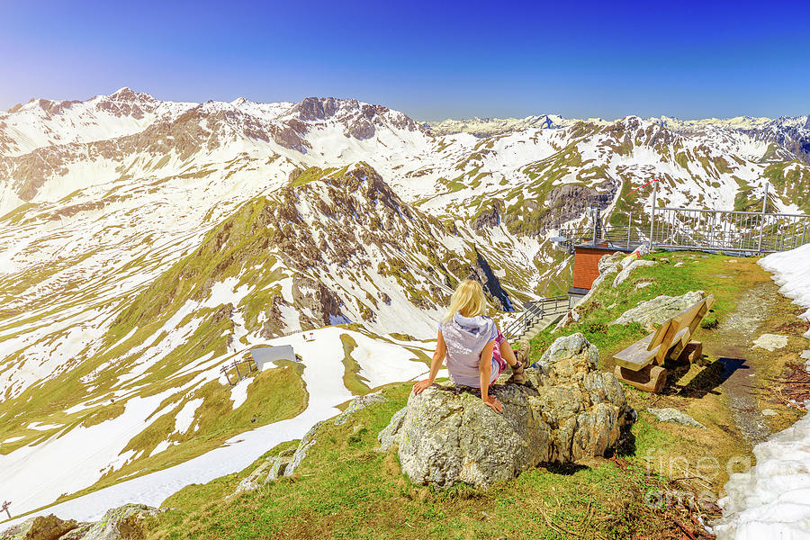 Woman on bench of Aroser Weisshorn sunset Photograph by Benny Marty