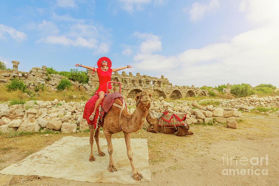 Woman on camel in Side archaeological site Turkey Digital Art by Benny Marty