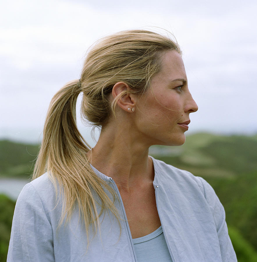 Woman outdoors, profile Photograph by Mike Powell