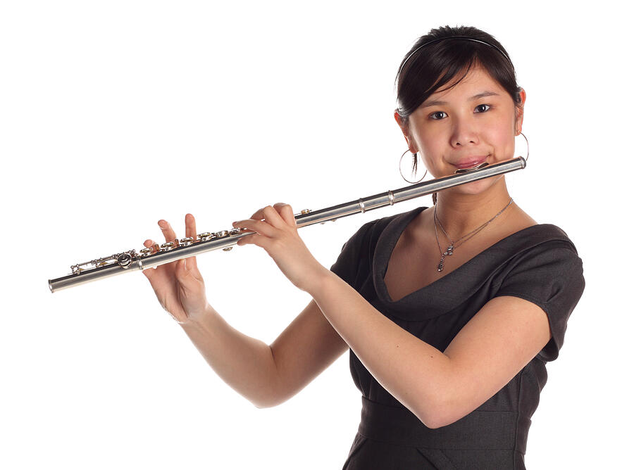 Woman playing flute Photograph by Matooker