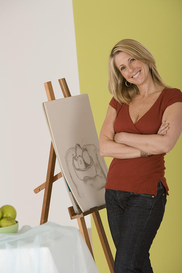 Woman posing by a sketch Photograph by Comstock Images