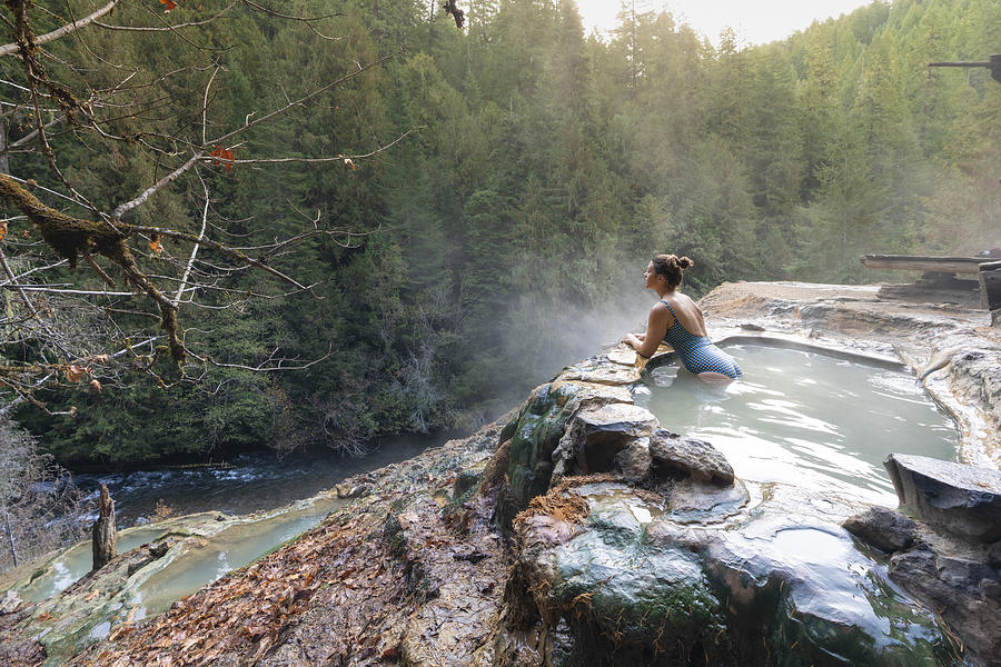Woman relaxing at Umpqua Hot Springs, Douglas county, Oregon, United States. Photograph by Francesco Vaninetti Photo
