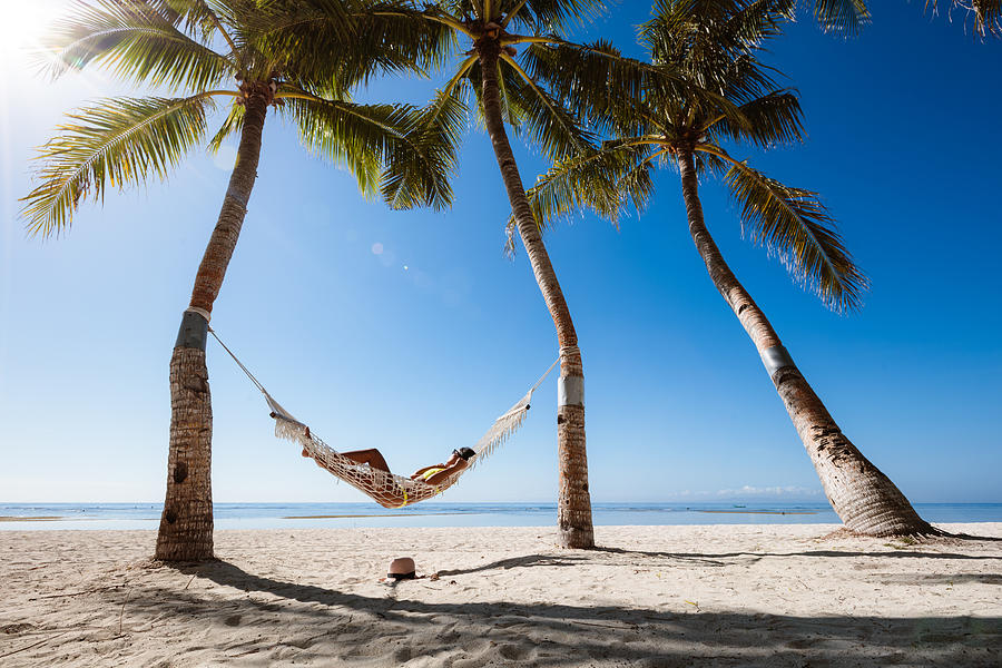 Woman relaxing in a hammock, Panglao, Bohol, Philippines Photograph by Matteo Colombo