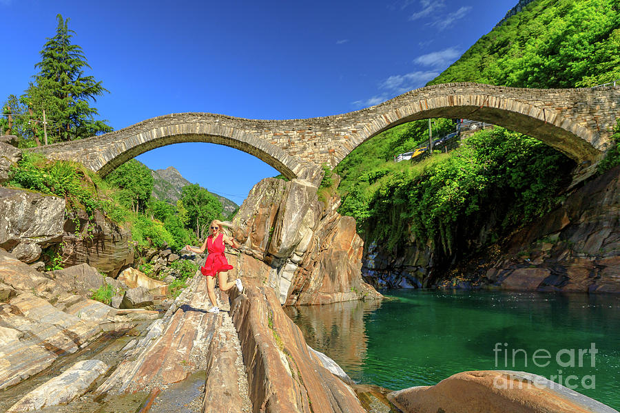 woman running at Ponte dei Salti Bridge Photograph by Benny Marty