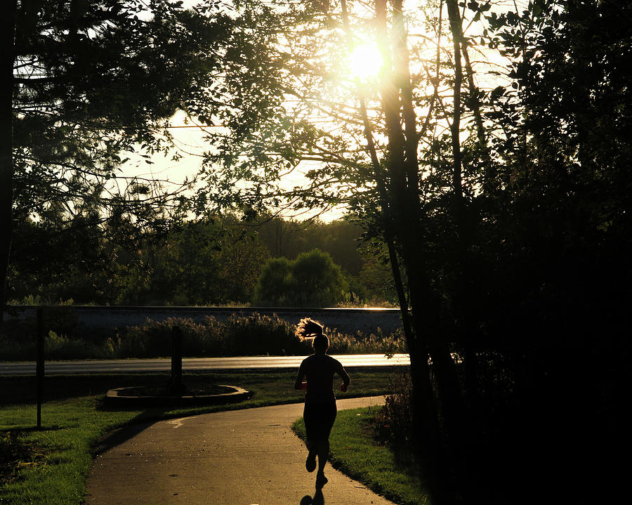 Woman Running Silhouette Photograph by Dan Sproul