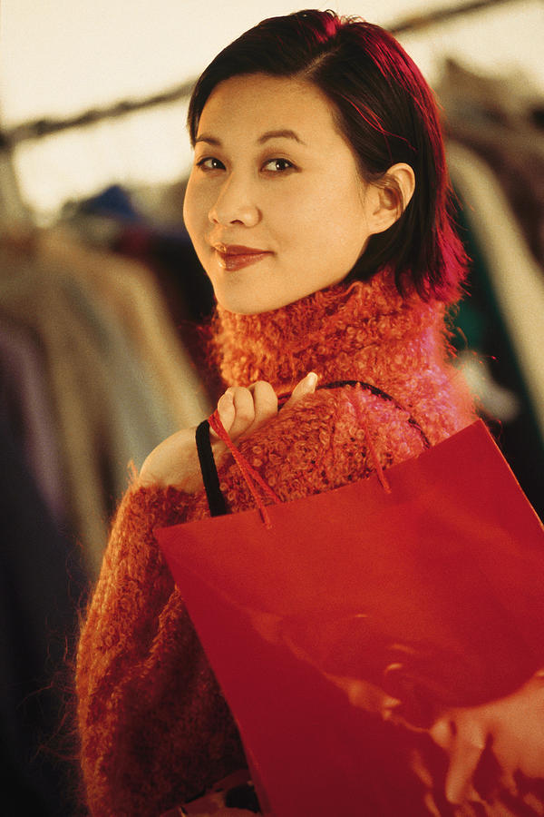 Woman shopping Photograph by Comstock