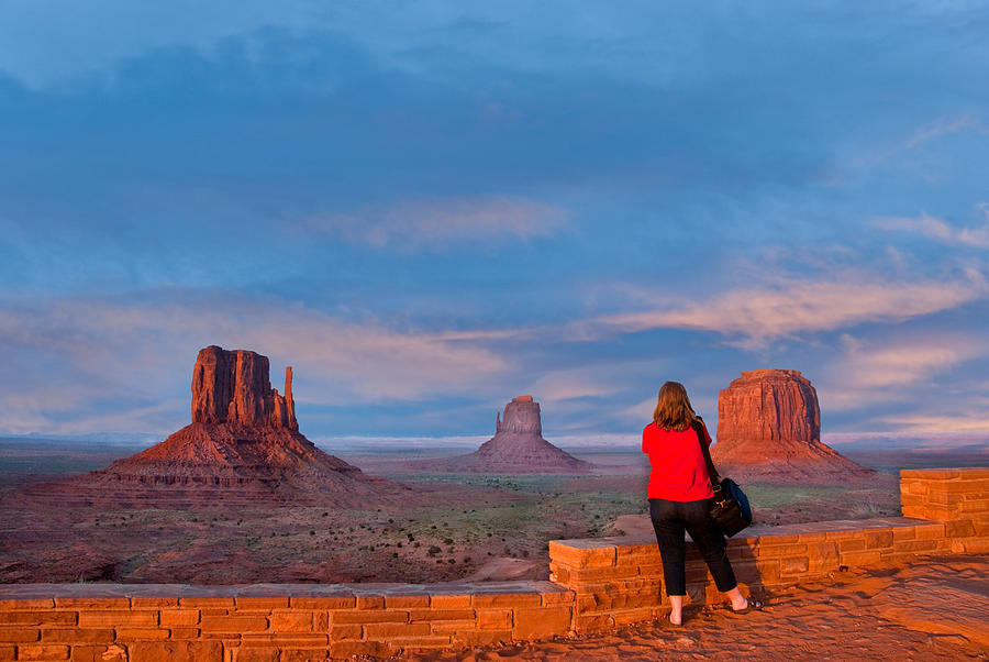 Woman Taking a Picture of Monument Valley Photograph by JeffGoulden