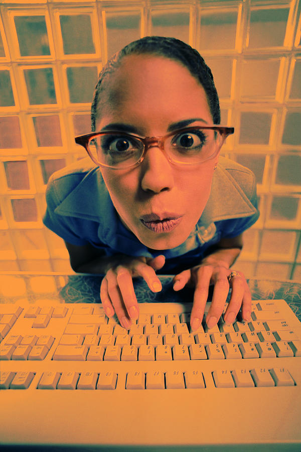Woman typing on keyboard Photograph by Thinkstock Images