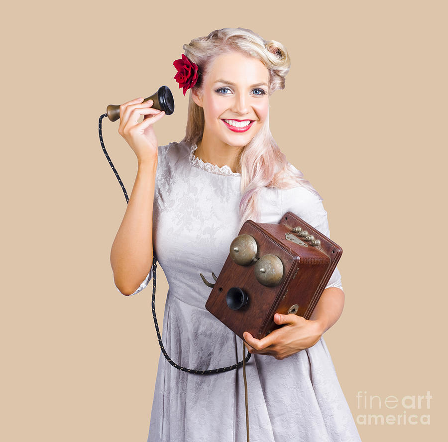 Woman using antique telephone Photograph by Jorgo Photography