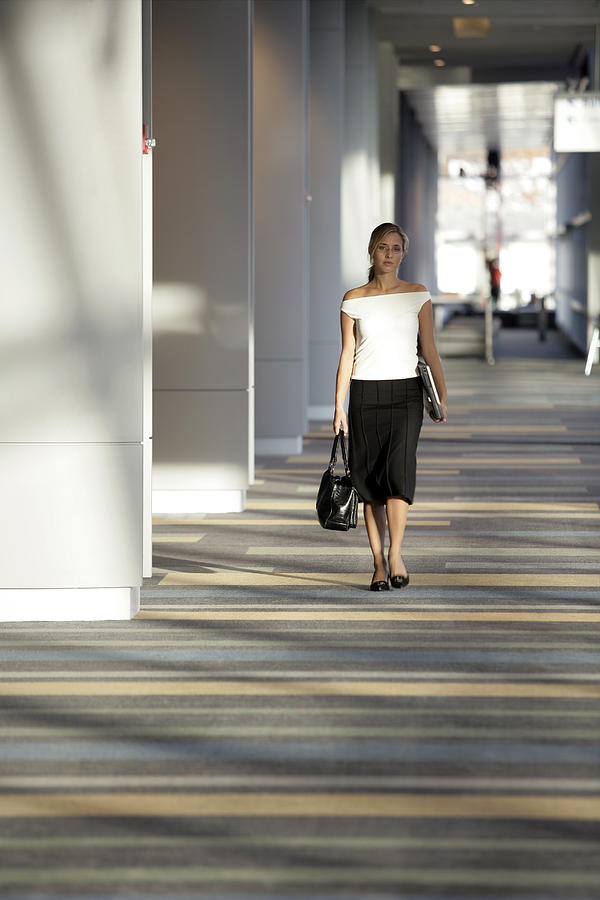 Woman walking Photograph by Comstock Images