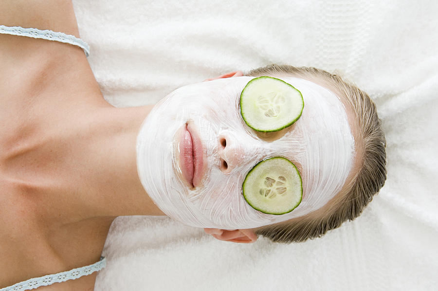 Woman wearing a face mask Photograph by Image Source
