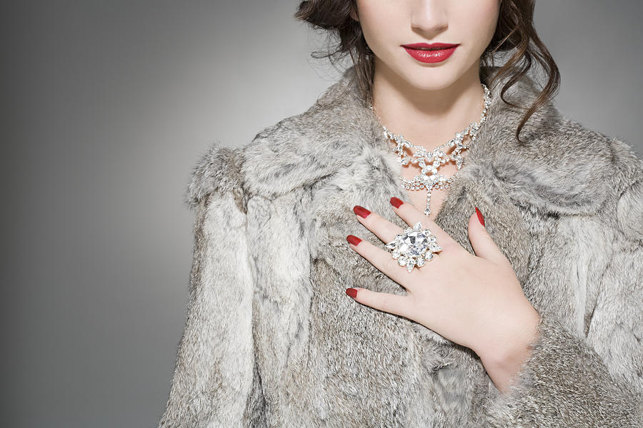 Woman wearing diamonds and a fur coat Photograph by Image Source