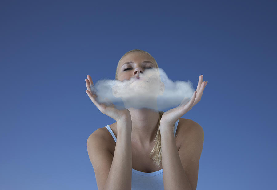 Woman with a cloud in her hands Photograph by Buena Vista Images