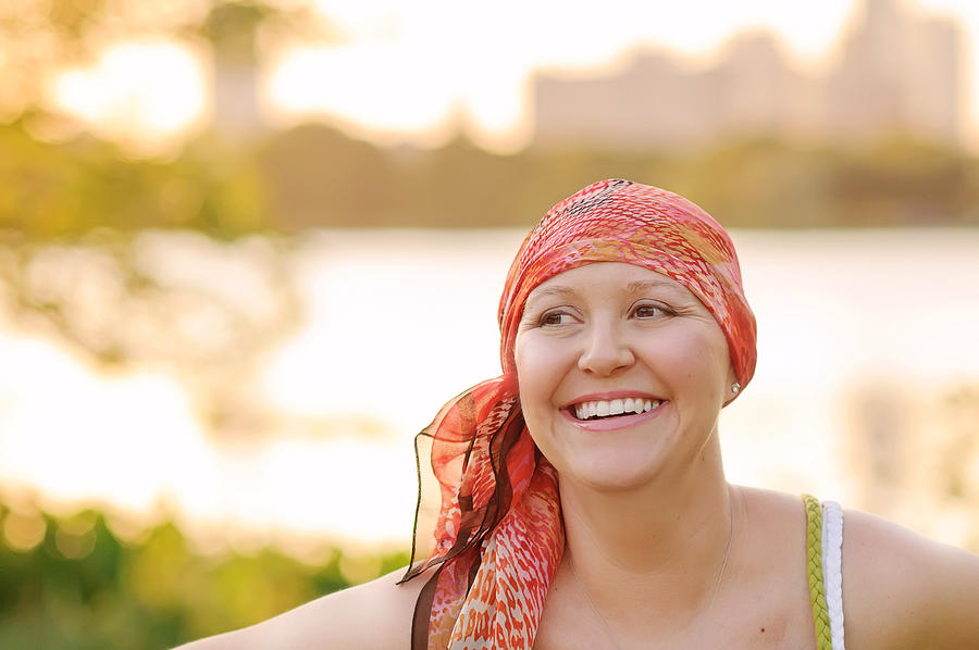 Woman with cancer wearing scarf Photograph by Holly Anissa Photography