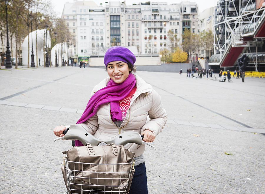 woman with parisian bike near Centre Pompidou. Photograph by Betsie Van Der Meer