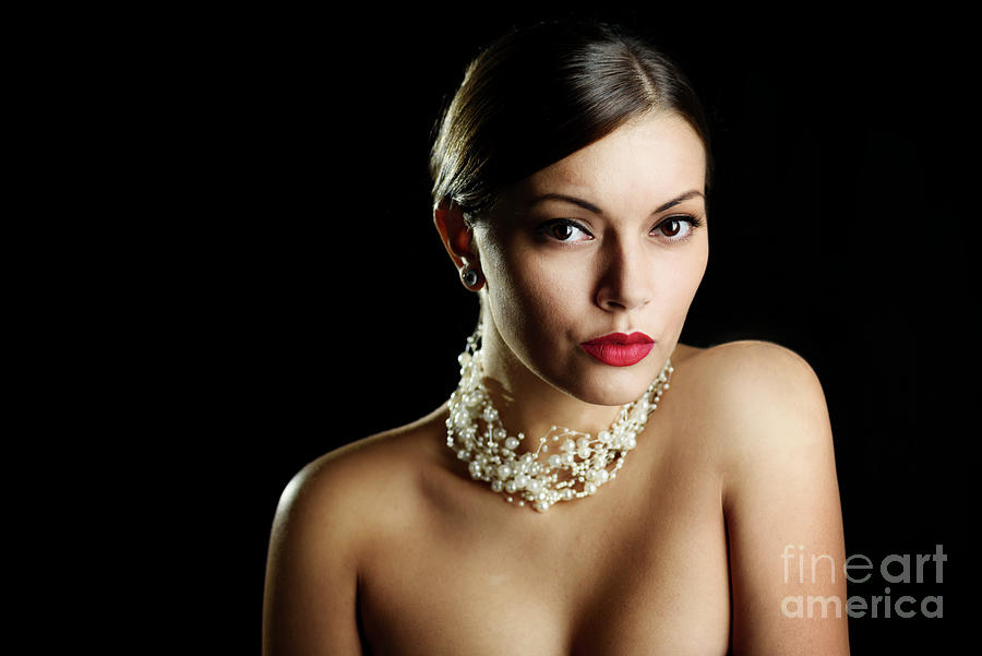 Woman With Pearls And Elegant Makeup On Dark Background Photograph