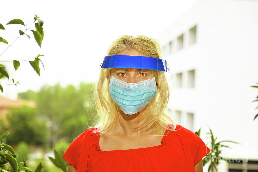 Woman with protective visor Photograph by Benny Marty