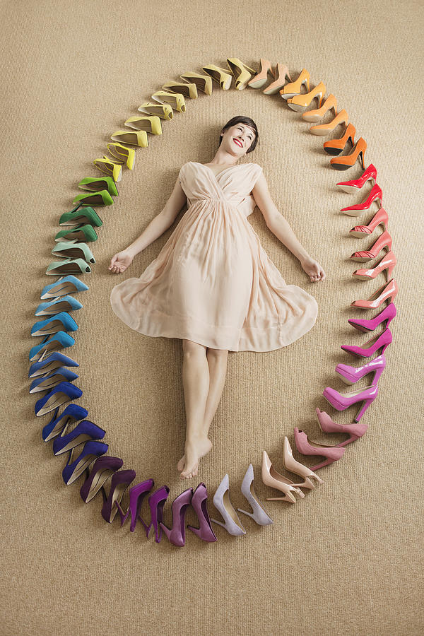 Woman with rainbow coloured shoes in oval shape Photograph by Anthony Harvie