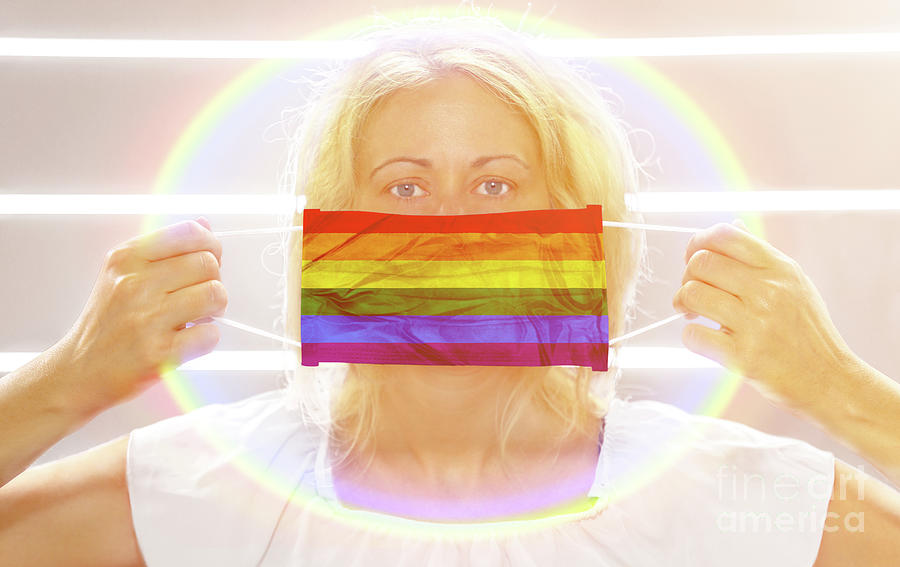 Woman with rainbow flag surgical mask on white Photograph by Benny Marty