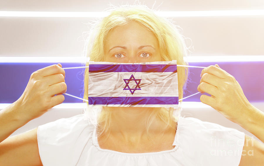 Woman with surgical mask in Israel Photograph by Benny Marty
