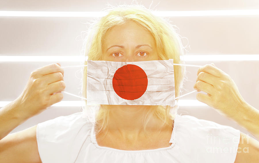 Woman with surgical mask in Japan Photograph by Benny Marty