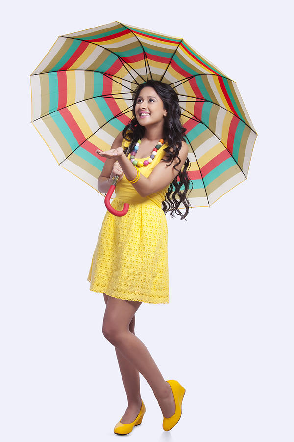 Woman with umbrella feeling for rain Photograph by Sudipta Halder