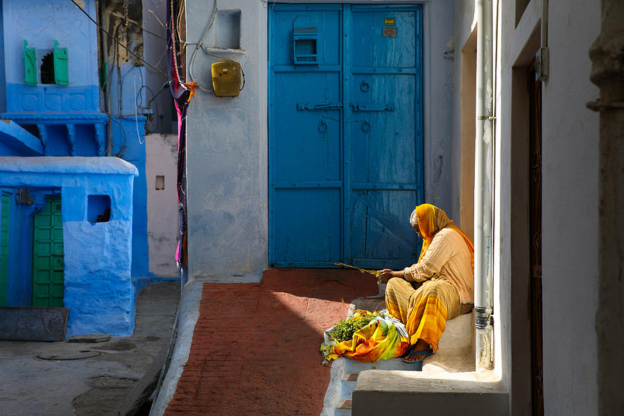 Woman working outside the residence Photograph by Dilwar Mandal