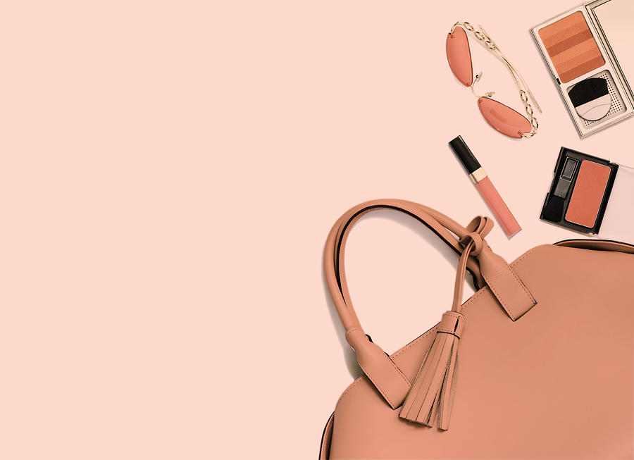 Womans handbag, make-up and sunglasses in trend coral color of 2019 Photograph by AnjelikaGretskaia