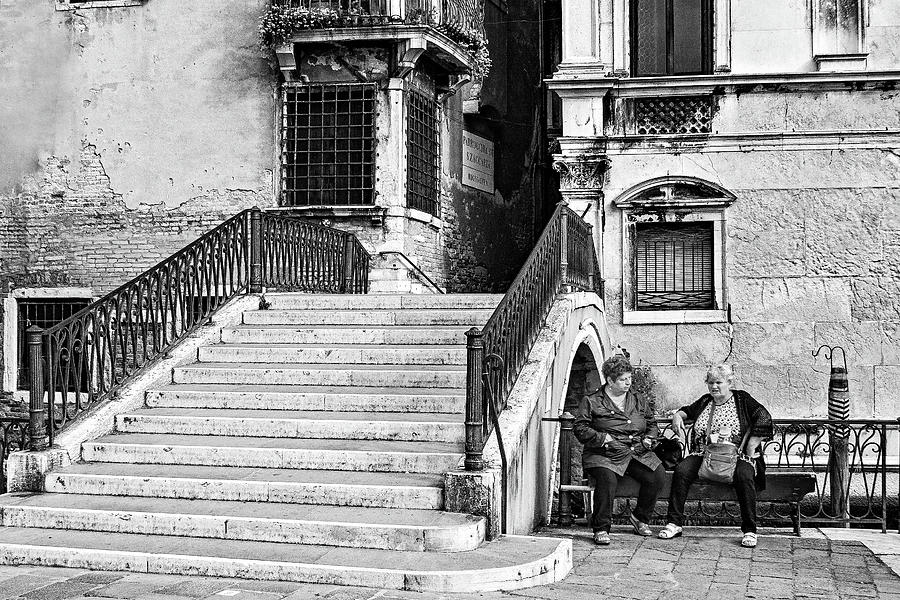 Black And White Photograph - Women by a Bridge in Venice by Barry O Carroll