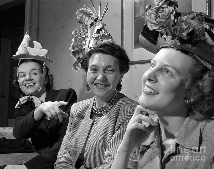 Women wearing funny hats 1946 Photograph by The Harrington Collection