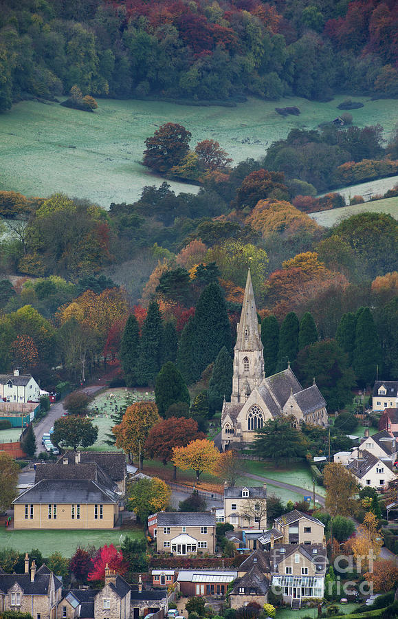 Woodchester on a Frosty Autumn Morning at Dawn Photograph by Tim Gainey