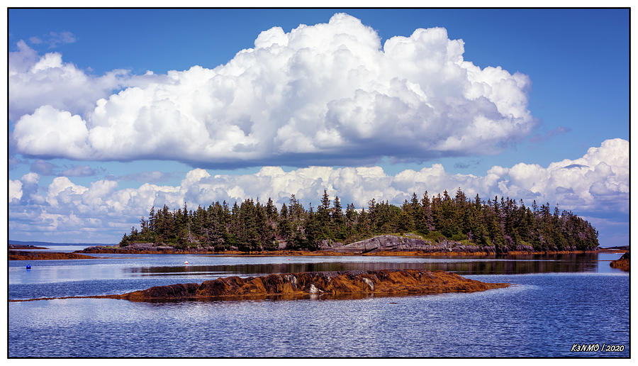 Wooded island off the coast of Nova Scotia Photograph by Ken Morris