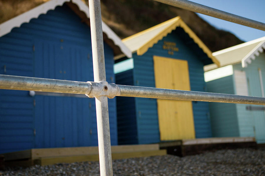 Wooden beach huts Photograph by Chris Yaxley
