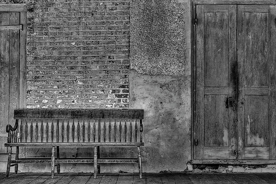 Wooden Bench And Doors BW Photograph by Susan Candelario