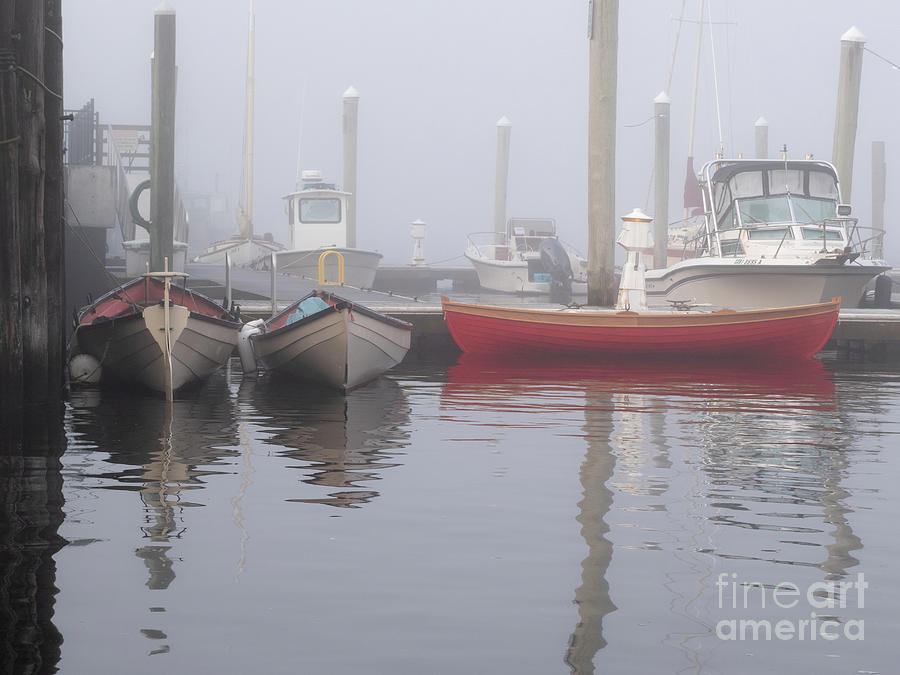 Wooden  boats and morning fog. Photograph by Butch Lombardi