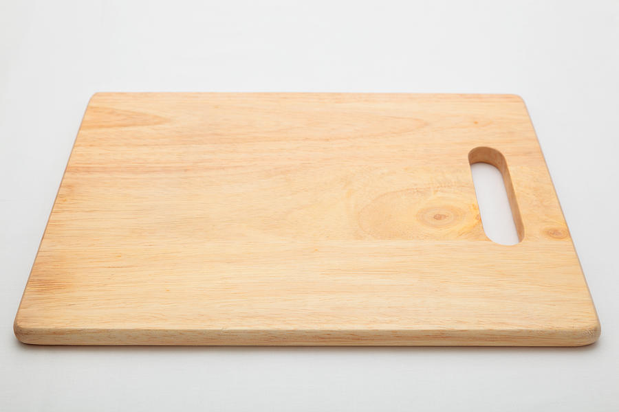 Wooden Chopping Board With Handle On Continuous Tone Background Photograph by Kbwills
