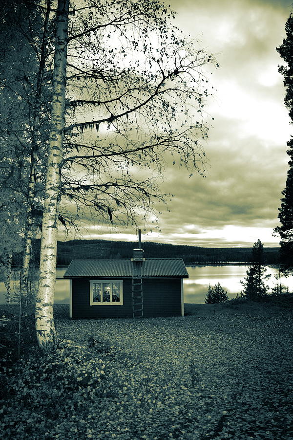 Wooden cottage at the shore of a lake at sunset in autumn Photograph by Ulrich Kunst And Bettina Scheidulin