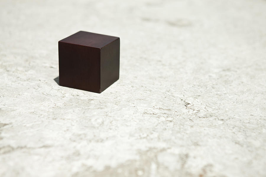 Wooden cube Photograph by PhotoAlto/Sandro Di Carlo Darsa