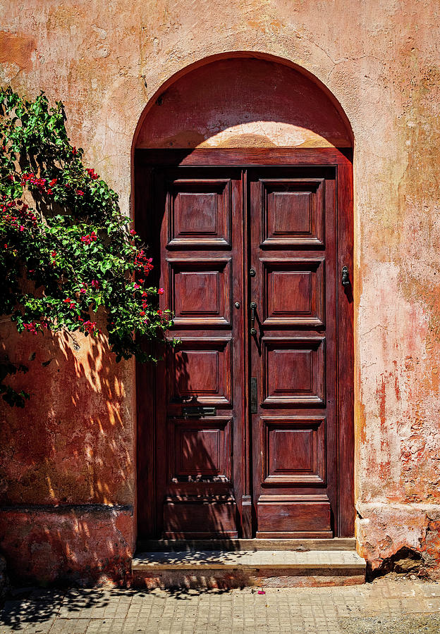 Wooden door in historical town of Colonia del Sacramento Photograph by Steven Heap