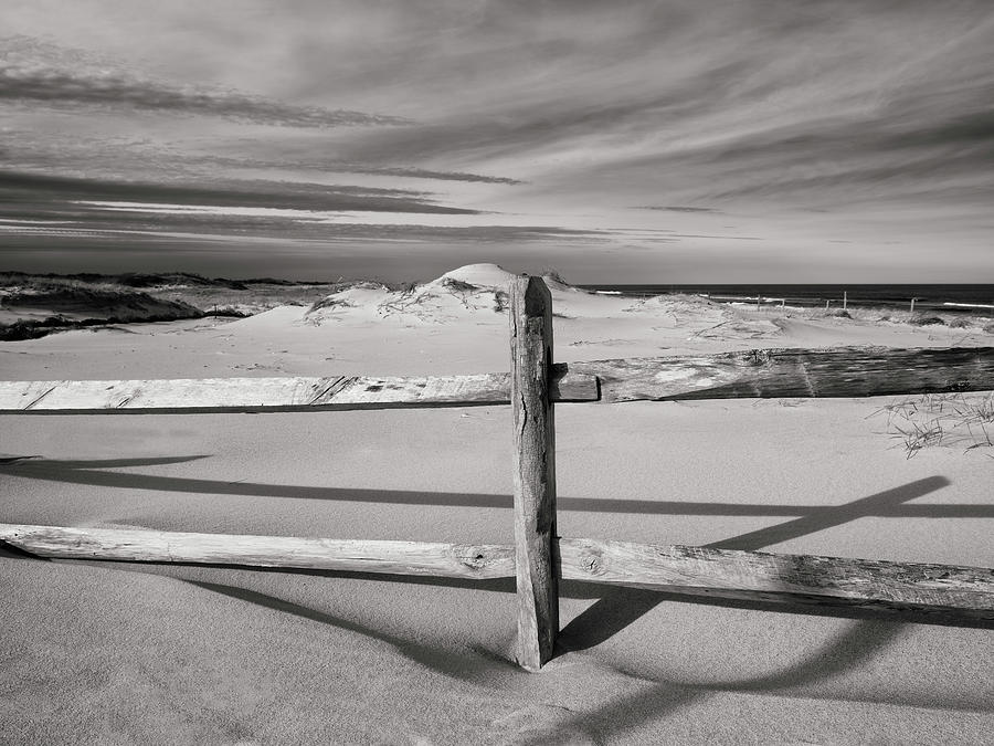 Wooden Fence And Sand Dune Photograph