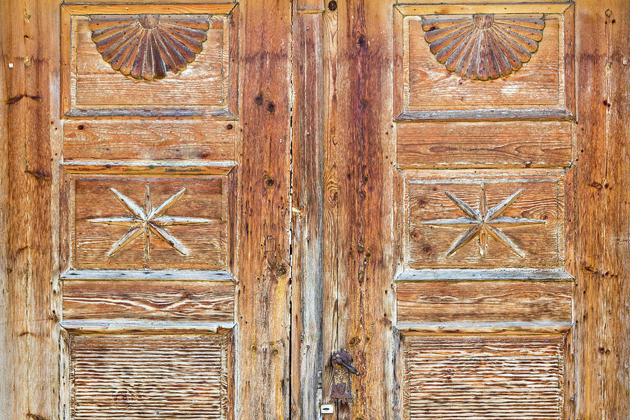 Patterns on wooden door Photograph by Viktor Wallon-Hars