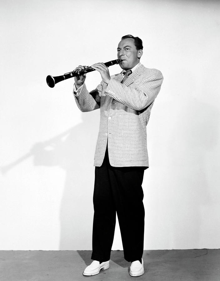 Woody Herman, American jazz clarinetist, alto and soprano saxophonist, singer, and big band leader. Photograph by Album
