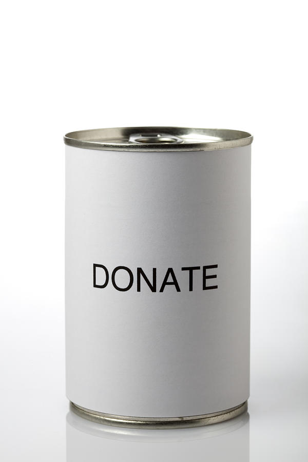 Word Charity On A Tin Can Photograph by Pascal Preti