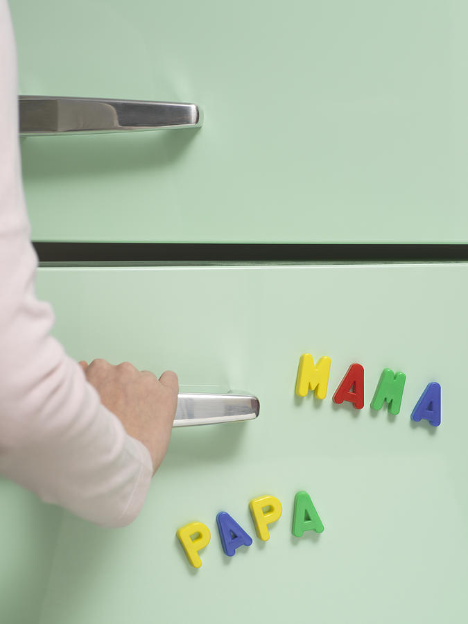 Words written with magnets on refrigerator Photograph by Image Source