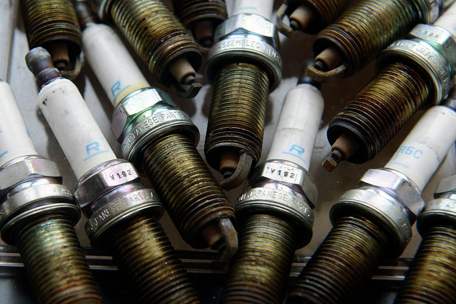 Work out spark plugs Photograph by Chris Smith