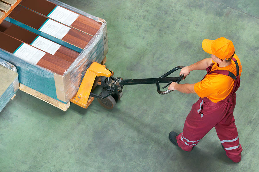 Worked with a fork pallet truck picking things up Photograph by Kadmy