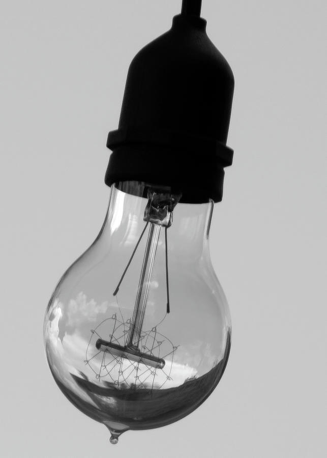 World IInside Lightbulb Photograph by Robert Wilder Jr
